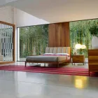 Letto matrimoniale di design con testata imbottita in pelle Menardo Viadurini