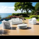Salotto da Esterno in Polyrattan Marca REHAU e Cuscini Bianchi - Charmix Viadurini