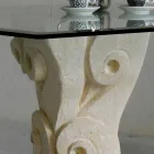 Tavolo da pranzo in pietra con piano in cristallo di design Giasone Viadurini