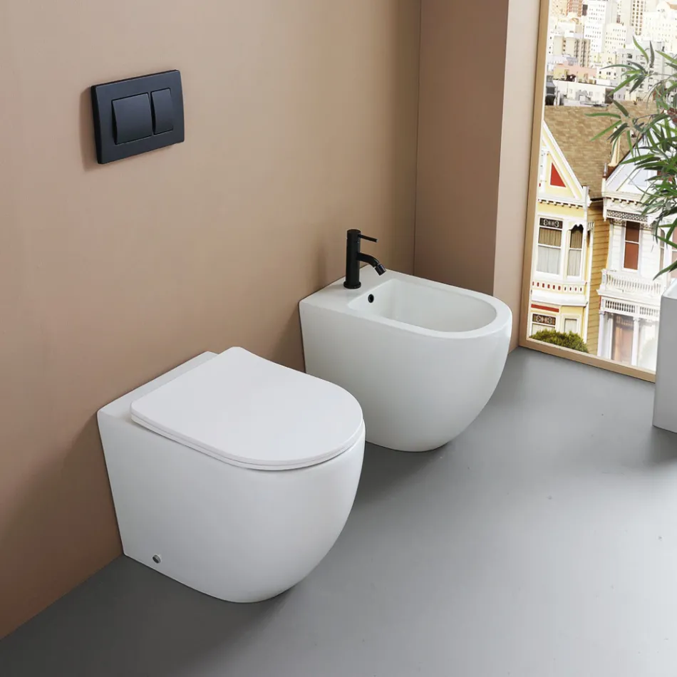 Vaso Wc a Terra Sedile Soft Close Termoindurente in Ceramica Bianca - Olmo Viadurini