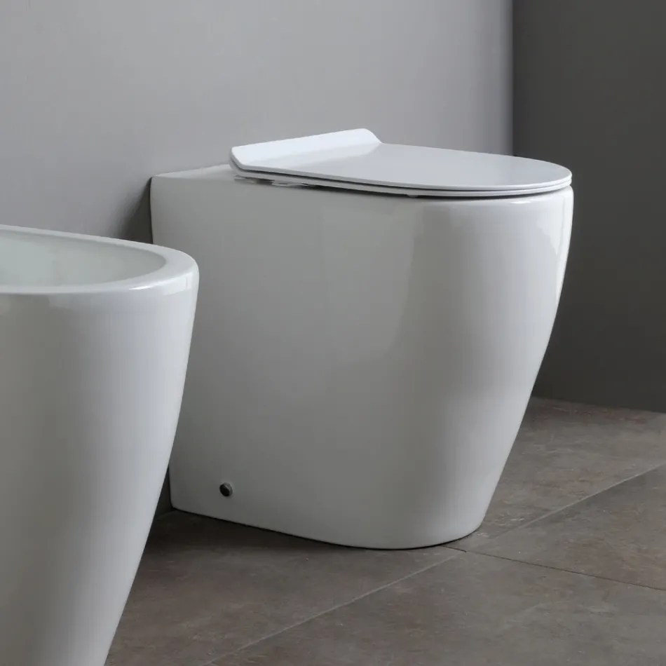 Vaso Wc con Scarico Traslato e Sedile Soft Close in Ceramica - Oleandro Viadurini