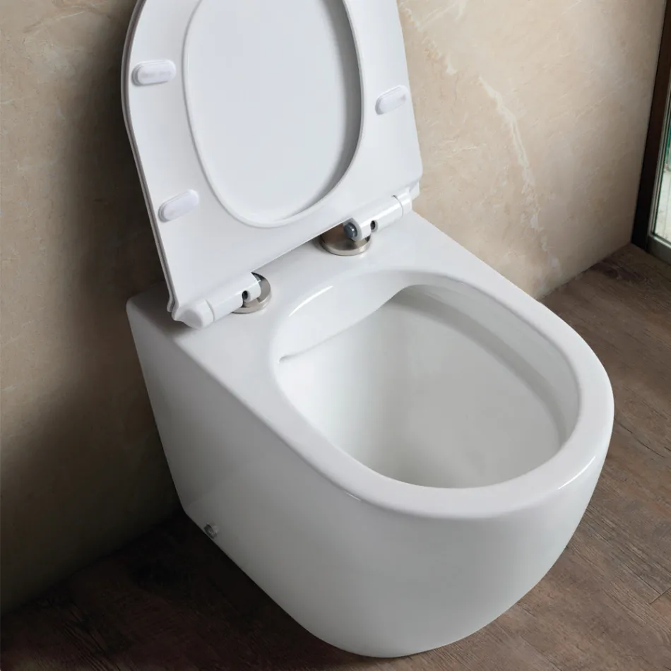 Vaso Wc Rimless a Terra in Ceramica Bianca e Sedile Soft Close - Aster   Viadurini