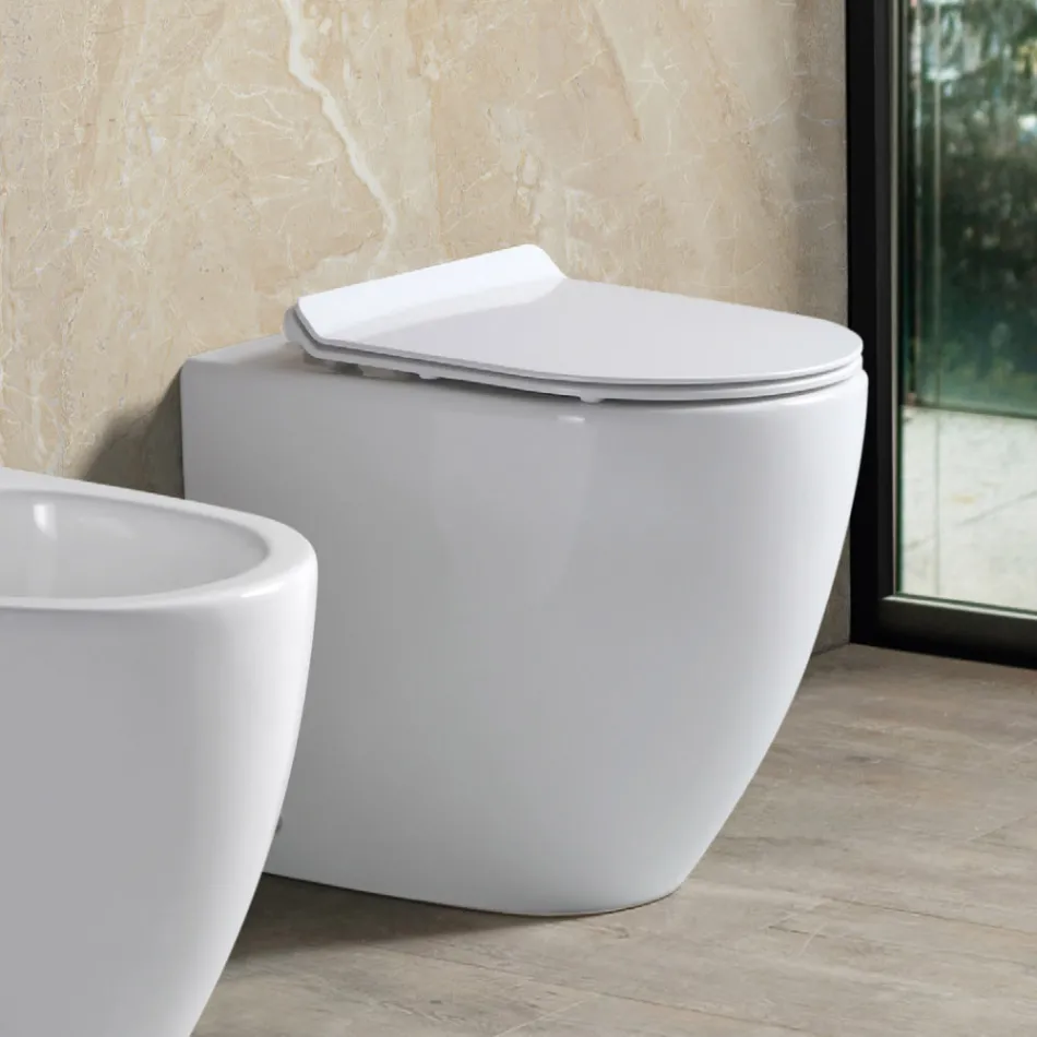 Vaso Wc Rimless a Terra in Ceramica Bianca e Sedile Soft Close - Aster   Viadurini